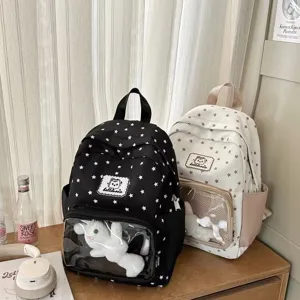 Star print transparent window ita backpack detail view showing cute rabbit plush inside compartment.