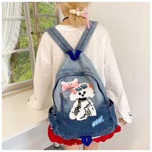 Sac à dos en denim avec patch chien mignon, grand cartable décontracté pour femmes.