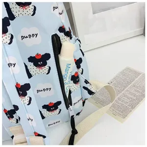 Detail view of cute cartoon puppy print backpack, casual student school bag with zipper pocket.