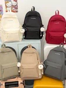 Solid color minimalist school backpack with cute pom-pom pendant, large capacity casual daily bag