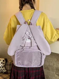 Cute sweet bunny ear backpack with ribbon lace-up detail and clear ita bag front pocket stylish.