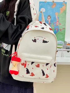 Cute Japanese style cat print canvas backpack with bone pendant for daily school student use.