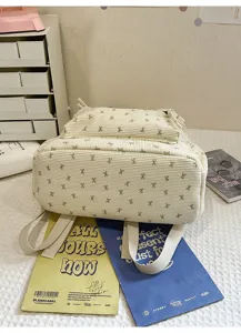 Cute corduroy bow backpack for women, large capacity college style school bag and casual daypack.