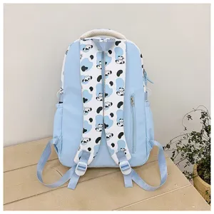 Light blue student backpack with cute cartoon puppy print, large capacity daypack.
