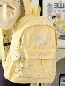 Yellow star print backpack for women, large capacity cute school bag for college students.