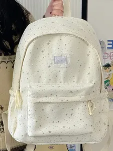 Chic star print canvas backpack for women, casual school bag with large capacity and lovely style.