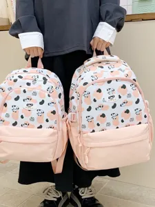 Cute cartoon puppy print school backpack, large capacity pink daypack for student daily use.
