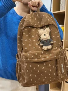 Korean style cute bow corduroy backpack for women, large capacity college student school bag.
