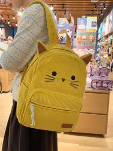 Cute yellow corduroy cat backpack for women, casual school book bag with cute ears and embroidery.