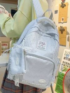Sweet style striped canvas backpack with lace trim, large capacity school bag for women.