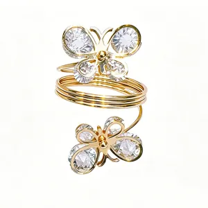 Gold tone butterfly rhinestone napkin ring for elegant wedding party and table setting decor.