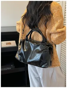 Zwarte zachte lederen vintage vrouwen handtas grote capaciteit schoudertas casual tas