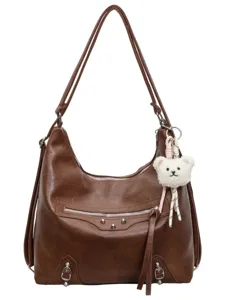 Brown multi-way hobo shoulder bag for women, featuring metal studs, zippers and bear charm.