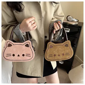 Cute cat shoulder bag detail view, casual college style messenger bag for daily autumn outfits.