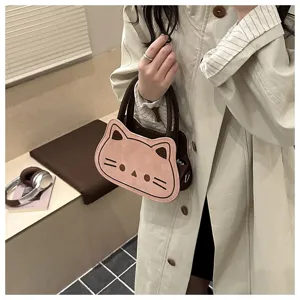 Detail shot of the cute cat-shaped shoulder bag, featuring minimalist daily style and sweet design.