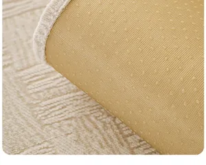Detail shot showing the anti-slip rubber dots and edge stitching of the cushion
