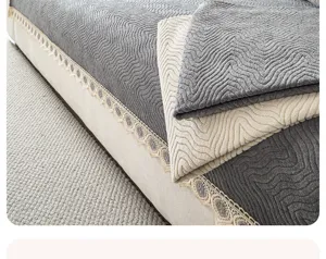 Chenille ruffled sofa cover with lace trim, anti-slip design for living room decor.
