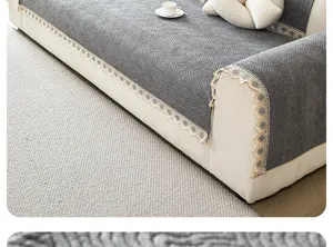 Grey chenille sofa cover detail showing exquisite lace trim and soft textured fabric surface.