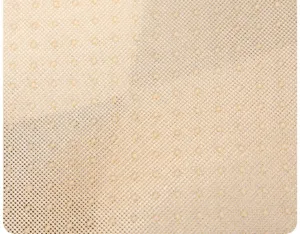 Close-up of beige anti-slip sofa cushion fabric texture with rubber dots backing detail.