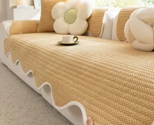 Cozy textured autumn winter sofa cushion cover with cute flower pillows detail view