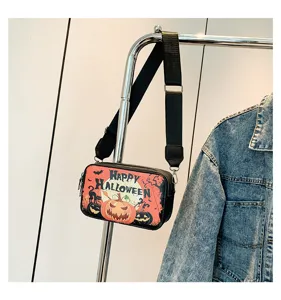 Halloween pompoen print schoudertas, trendy crossbody tas voor dames, chique zwarte handtas.