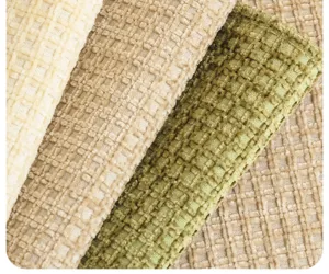 Détail de tissu de coussin de canapé en chenille française, design texturé, tissu de déco.