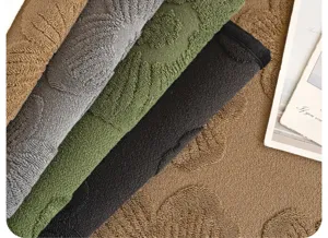 Chenille non-slip sofa cushion cover fabric detail with textured relief patterns in multi colors.