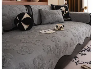 Grey chenille sofa cover with embossed floral pattern, non-slip luxury living room cushion.