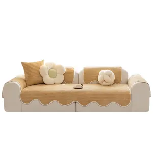 Modern beige knitted sofa cushion cover set with elegant scalloped edges for living room decor.