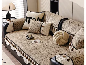 Chenille bankhoes detail, retro geometrisch patroon, kwastjes, luxe woonkamer decor.