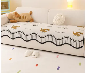 Detailed view of the cozy chenille sofa cover featuring cute puppy patterns and wave edges.