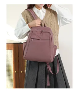 Stylish nylon backpack for women, large capacity school bag, perfect travel companion.