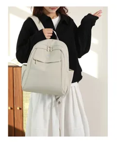 Casual nylon backpack for women, large capacity travel school bag in light beige. Perfect for daily use.