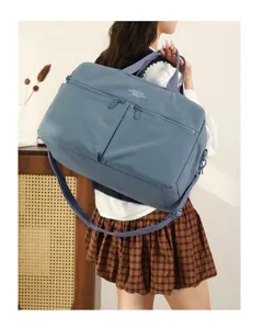 Stylish blue travel duffel bag for women, weekend fitness sports gym bag with wet dry separation.