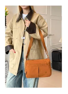 Casual multi-layer canvas crossbody bag with wide strap, lightweight daily wear stylish shoulder bag
