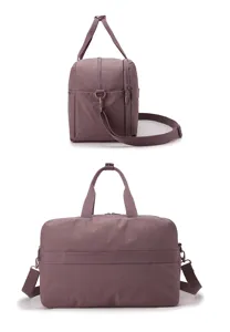 Detailed view of women travel gym bag with wet dry separation design for fitness sports and yoga.
