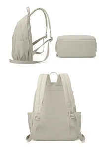 Detailed view of the women's nylon backpack showcasing adjustable straps, zippers, and side pockets.