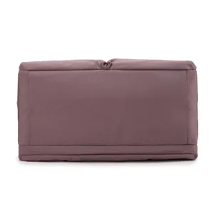 Travel gym bag detail view, mauve pink fabric material, clean stitching design for daily use.