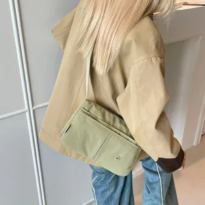 Casual multi-layer canvas crossbody bag for women, lightweight everyday casual shoulder bag.
