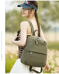 Casual green backpack with multiple zipper pockets, lightweight commuter daypack for daily use.