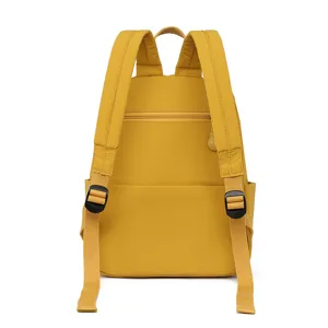 Casual yellow nylon backpack for women, lightweight travel daypack and school bookbag.
