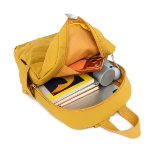 Detail view showing spacious interior capacity of the casual yellow backpack with items.