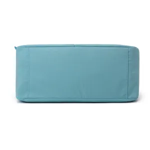 Blue crossbody bag bottom detail view, casual shoulder bag fabric texture close up view.