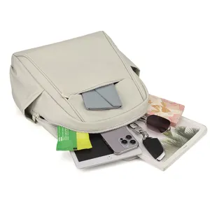 Nylon backpack interior detail showcasing large capacity storage for daily essentials and devices.
