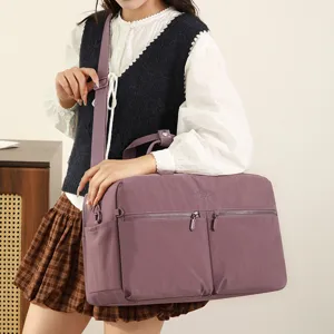 Women stylish purple travel gym bag with wet dry separation, perfect for sports, yoga, fitness.