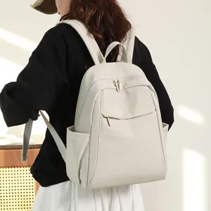 Detailed view of the women's casual nylon backpack with front pocket and shoulder straps.
