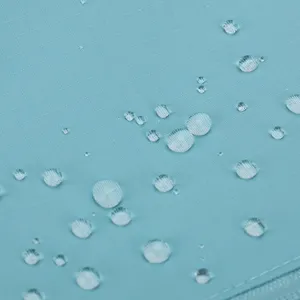 Water-resistant fabric detail of casual crossbody bag, showing excellent waterproof performance.