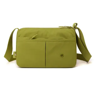 Casual multi-layer canvas crossbody bag for women, lightweight daily shoulder handbag.