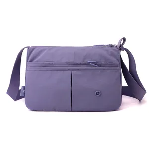 Casual multi-pocket purple crossbody bag for women, lightweight nylon daily shoulder handbag.