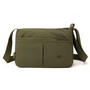 Stylish multi-layer nylon crossbody bag for women, lightweight casual single shoulder bag.